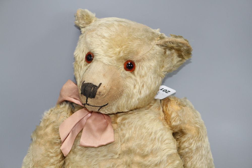 A Chiltern bear, c.1930, 27in., original velvet pads, some hair loss on right left arm and body